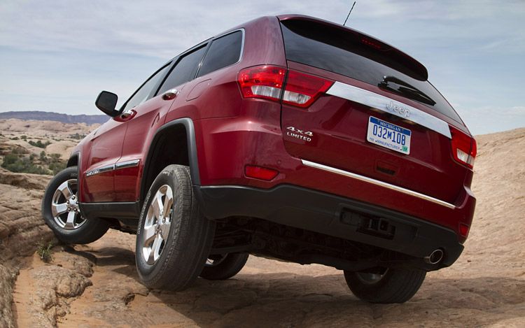 2011-jeep-grand-cherokee-limited-rear-three-quarters-static-driver.jpg