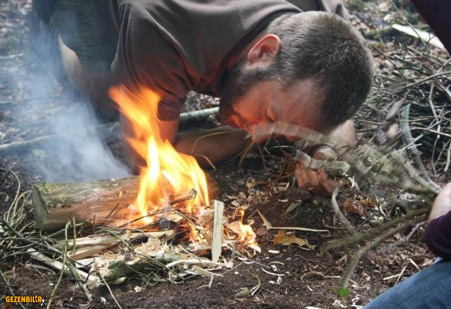 Lighting-a-fire-in-forest.jpg