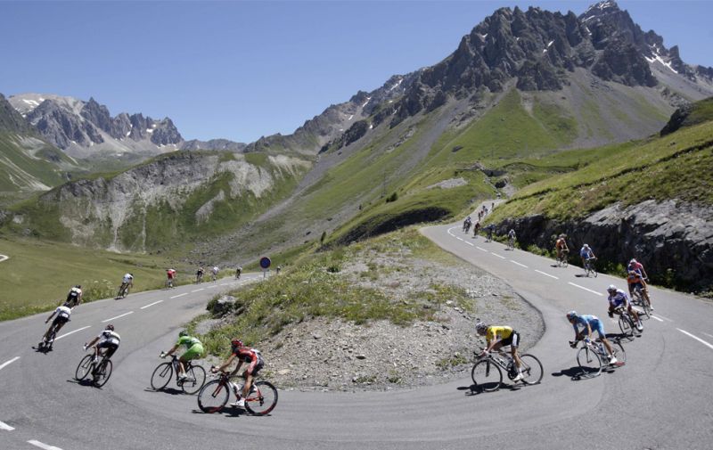 TF 0048 The pack with Frank Schleck of Luxemburg speeds down Galibier pass during the stage17 betwe