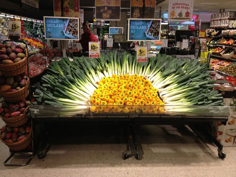 vegetable-display-sun-grocery-store-supermarket-peppers-leeks.jpg